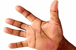 The open palm of a black man