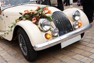 Vintage Wedding Car Decorated with Flowers