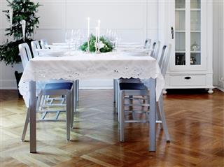 Dinner table set for a minimalistic Christmas celebration