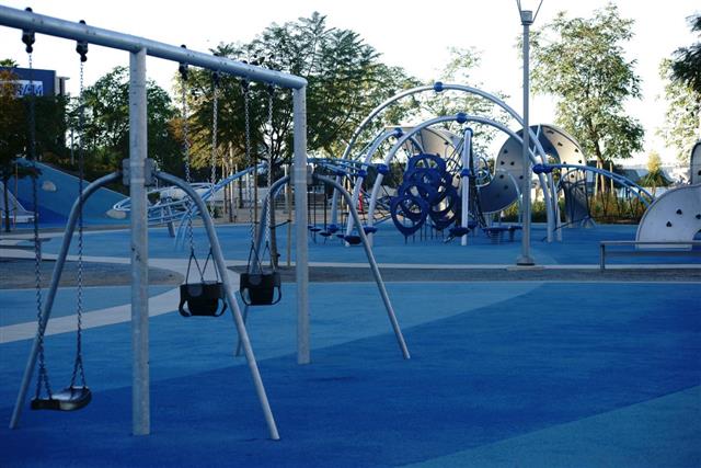 Modern playground with swings