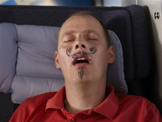 Sleeping Man with Drawn Mustache