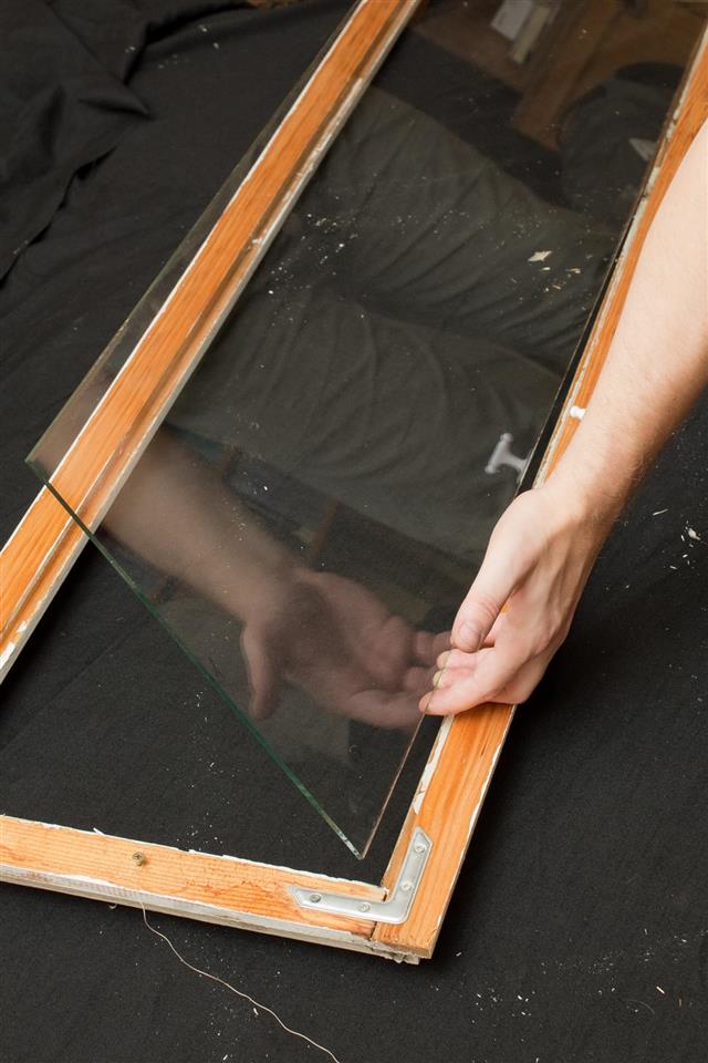 inserted into the window frame glass
