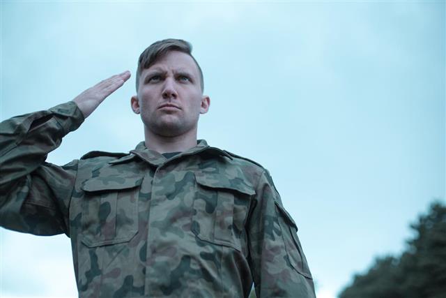 Male soldier saluting