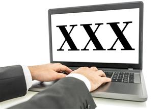 XXX Written on Laptop Screen