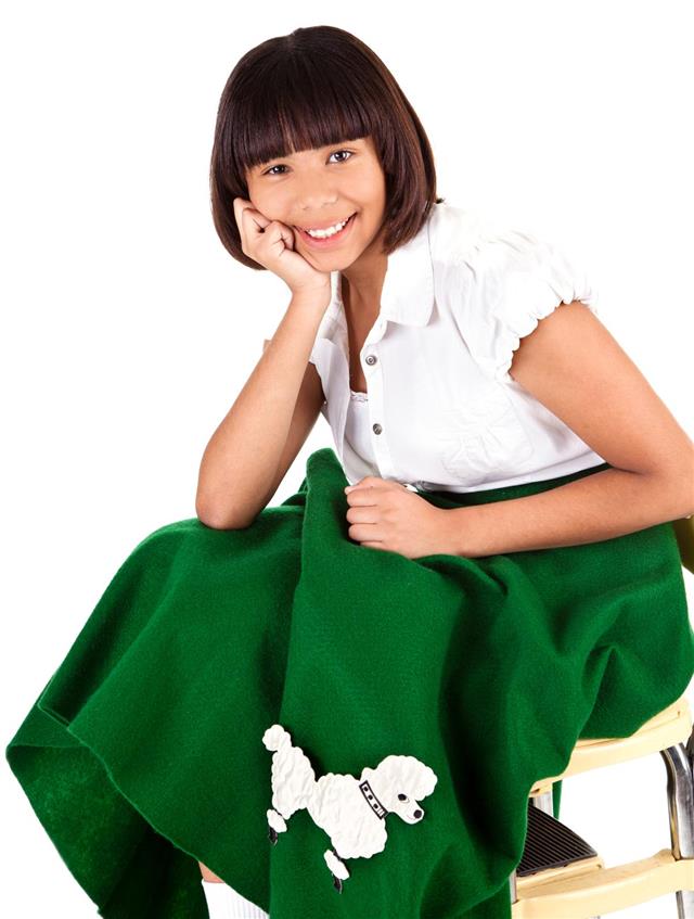 Young teenager in poodle skirt fashion