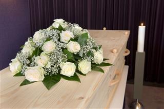 Flower arrangement on coffin