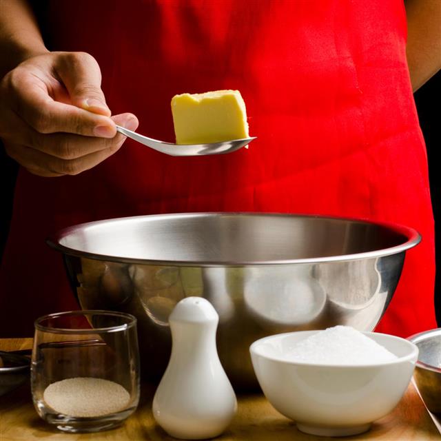 adding butter in bowl