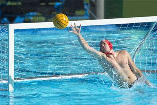 Water Polo Goalie in Defensive Action