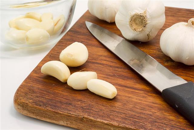 White garlic bulbs and cloves