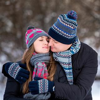 Loving couple in winter park