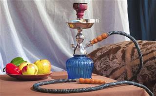 Hookah in interior. Smoking room. Relaxation and resting place