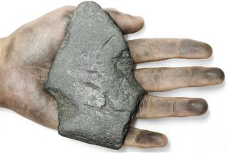 Sample of the mineral graphite on hand