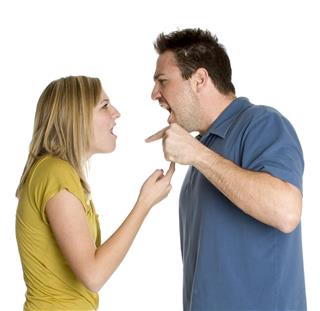 Angry male and female couple fighting