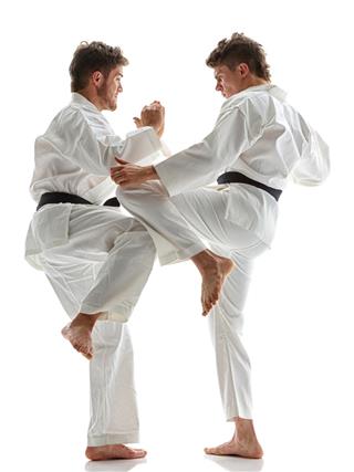 Martial Artists fighting with Stomping Knee Joint Kick