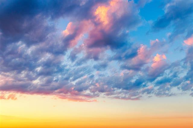 Colorful Cumulus Humilis Clouds at Sunset