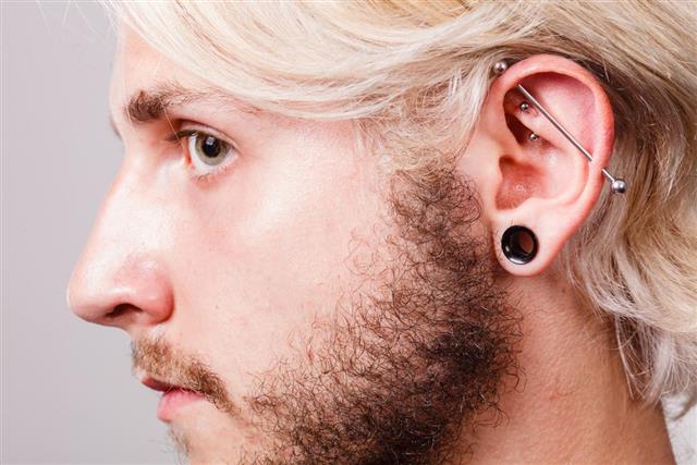 Pierced man ear