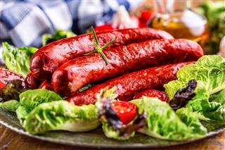 Raw smoked sausage with vegetable