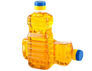 Two plastic bottles with vegetable oil