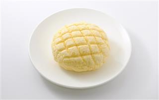 Japanese bread melon pan sunrise on plate on white background
