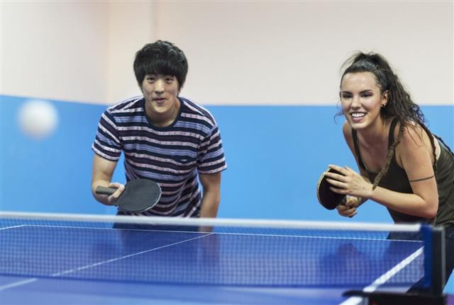 Friends Playing Table Tennis