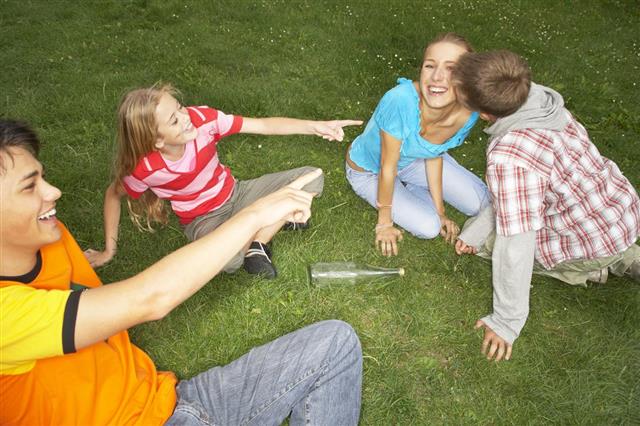 Teenagers playing in a park