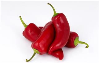 Hot red peppers or Fresno
