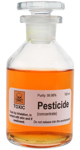 Bottle of orange-colored pesticide