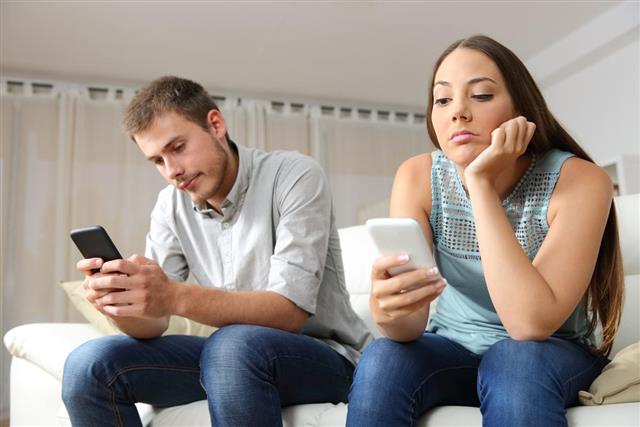 Bored Couple with Smartphones