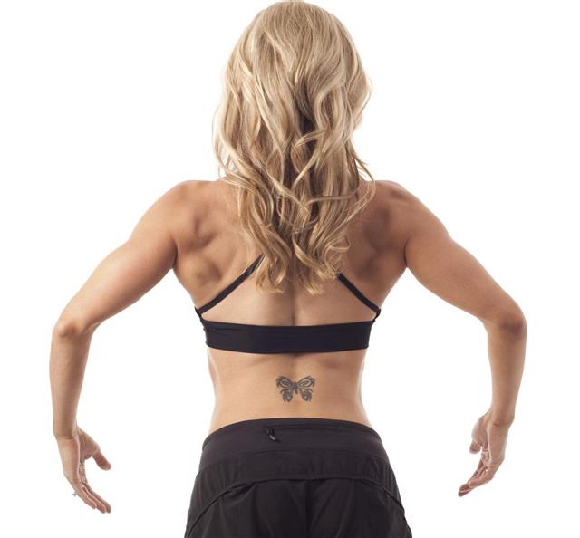 Fit Woman Flexing Back Muscles