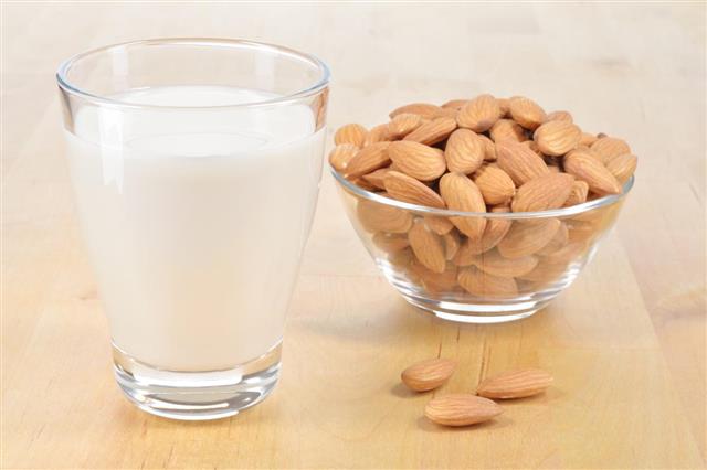 Glass of Almond milk on a table