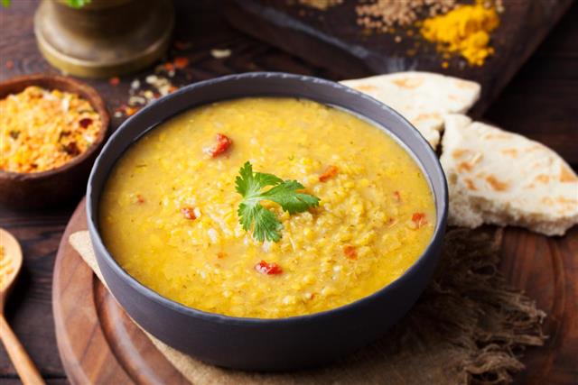 Red lentil Indian soup with flat bread