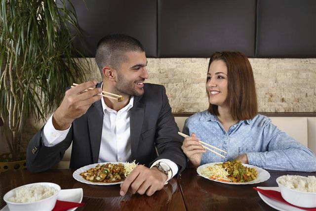 Couple Eating Chinese Food
