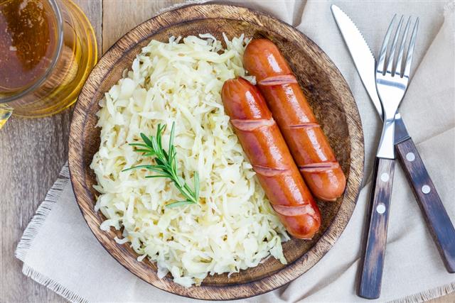 Homemade sauerkraut with sausages and beer