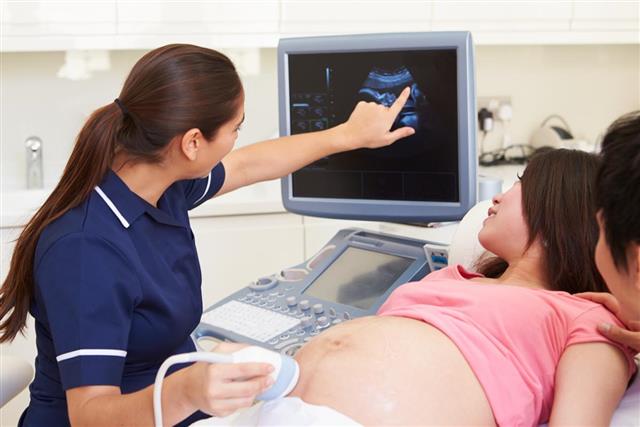 Pregnant woman having a 4D ultrasound scan