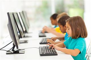 Elementary school students in computer class