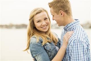 Young Couple Embracing with Copy Space Horizontal