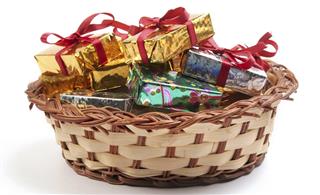 Gift wrapped boxes in a weaved basket