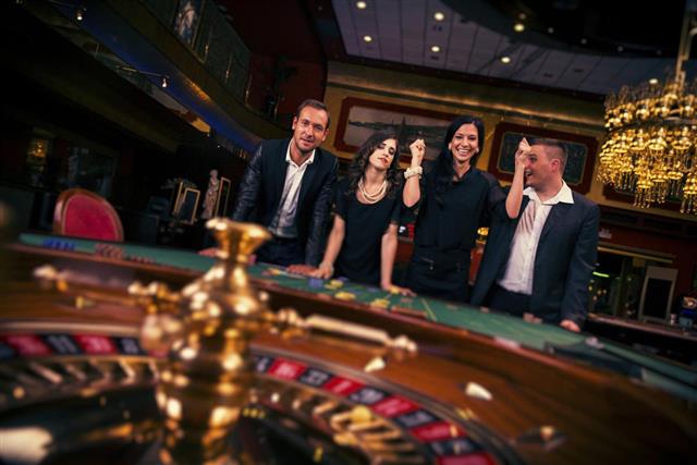 People playing roulette at the casino