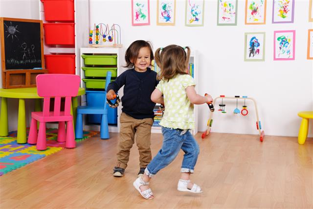 Toddlers/ Little Children Enjoying Music And Dance At Nursery