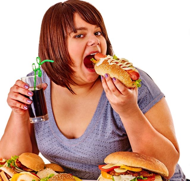 Girl eating big sandwich