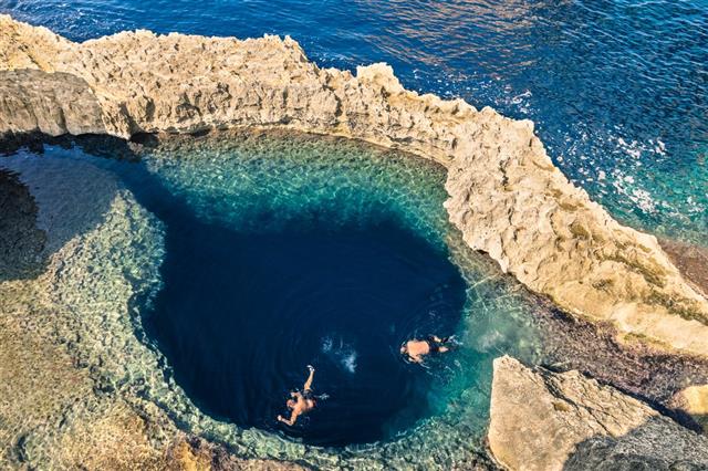 Blue hole at Azure Window in Gozo Malta