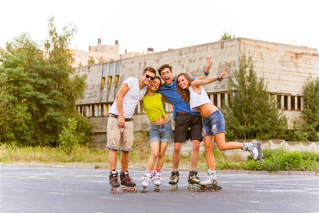 Young people on rollerblades