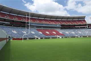 Internal view of football stadium in blue and red