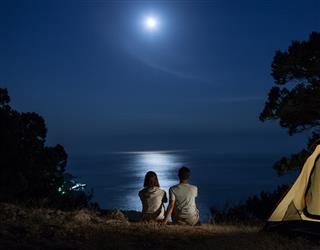 Silhouette of couple at night