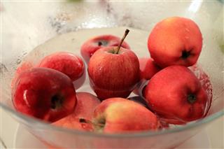 Red apples dipped in Vinegar