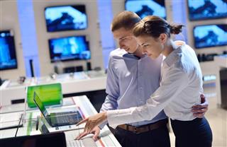 Couple at Consumer Electronics Store