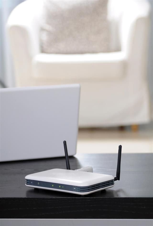Wireless internet modem on coffee table in house