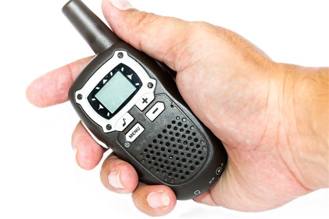 Handheld walkie talkie on white background