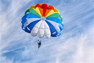 Parasailing in sunny day