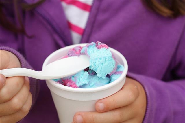 Ice cream with plastic spoon